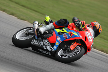 Motorcycle racer Benny T exiting an apex